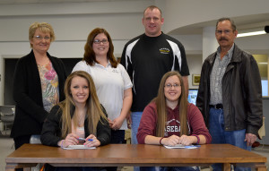 Nicole and Rachel Zelinsky, both of North Platte with Coach Higgins, Parents and Former Coach